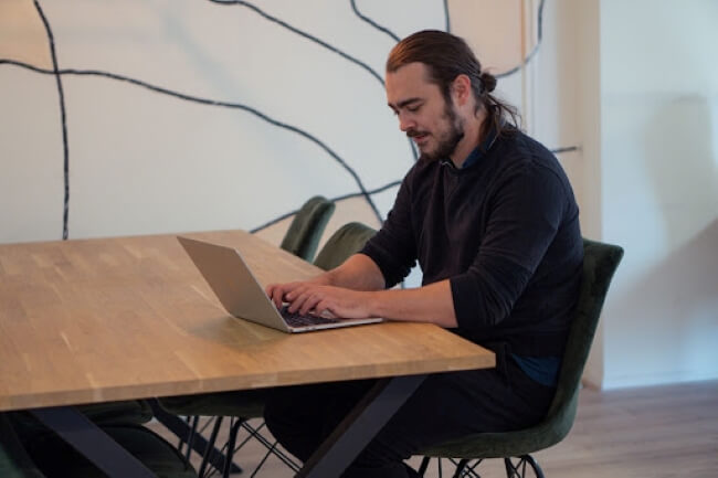 Conor working in the office