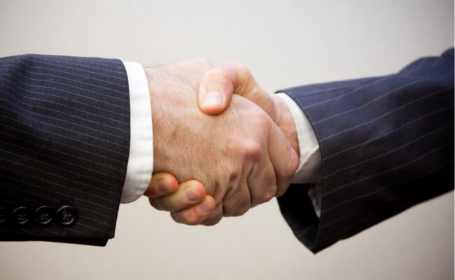 Mopinion: It's time to speak to your digital agency about online customer feedback - Shaking hands